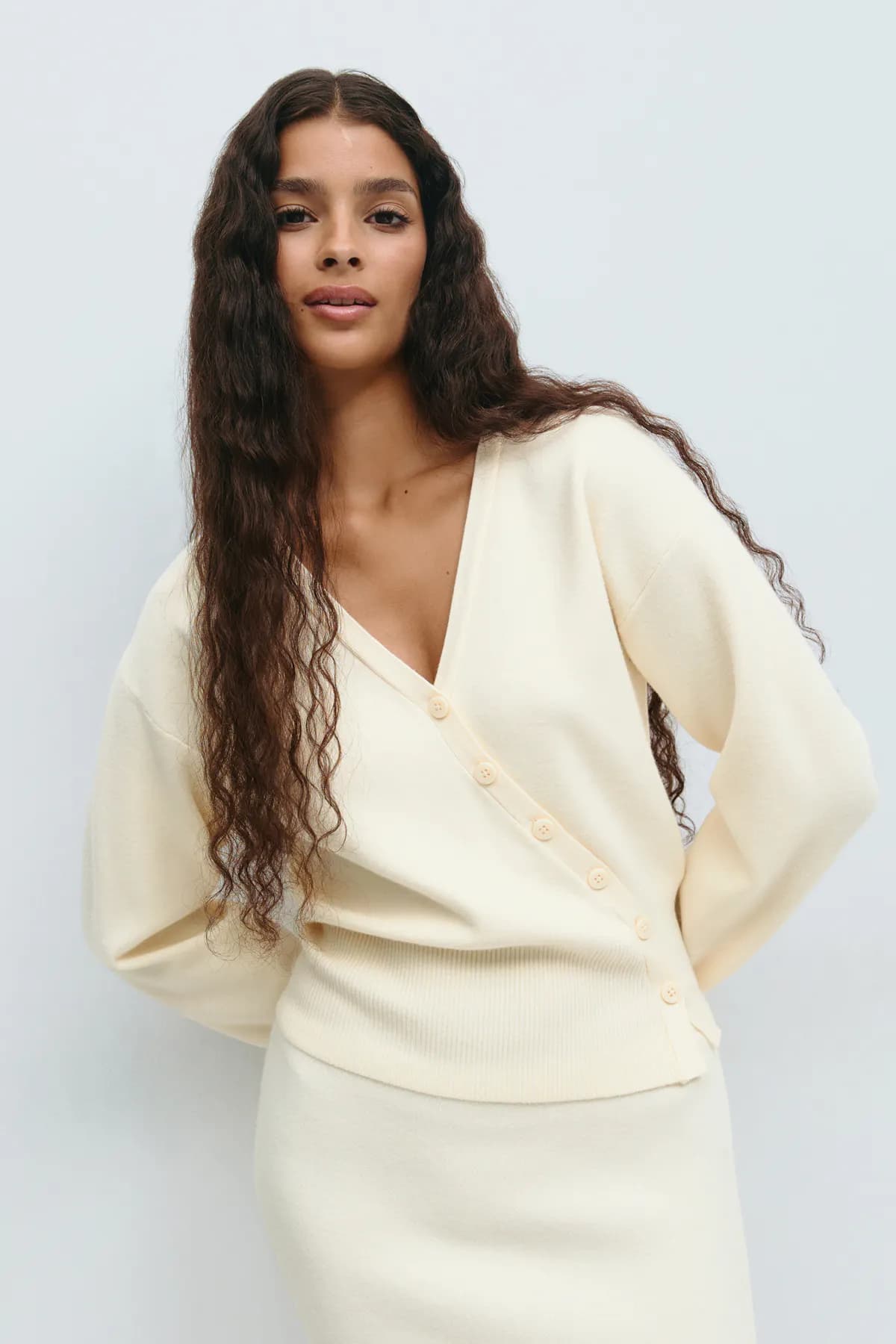 Asymmetric knitted cardigan - Image 1