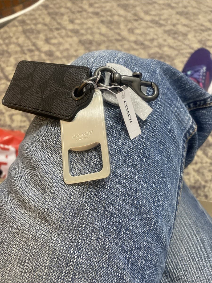 COACH  Bottle Opener Key Fob In Signature Canvas Gunmetal/Charcoal - Image 1