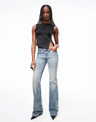 Bershka low waist boot cut jeans in blue - Image 1