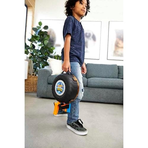 Hot Wheels Toy Monster Trucks Playset, Tire-Shaped Case Transforms into Race Course, 3 Trucks & 4 Cars in 1:64 Scale, Stunt Tire (Amazon Exclusive) thumbnail 4