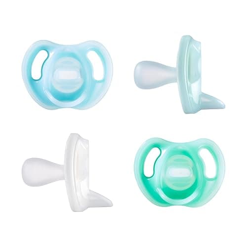 Tommee Tippee Ultra-Light Silicone Pacifier, 0-6 Months, Symmetrical One-Piece Design, BPA-Free Silicone Binkies, Blue/Green/Clear, Pack of 4 - Image 1