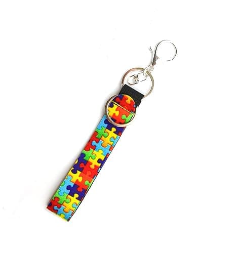Charmed By Dragons Autism Keychain Awareness Acceptance - Neoprene Wristlet with Puzzle Pieces - Double Keyring - Large Lobster Clasp - Image 1