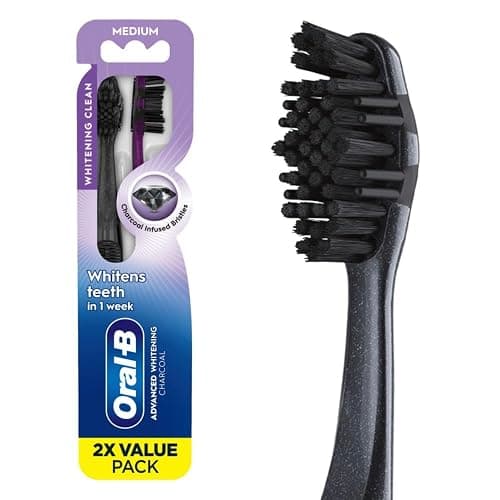 Oral-B 3D White Charcoal Toothbrush, 2 Count Medium Manual tootbrush Pack, Whitens Teeth, removes Plaque and Stains, Tongue Scraper Tooth Brush - Image 1
