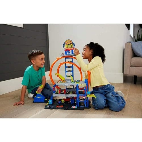 Hot Wheels Toy Car Track Set with Die-Cast Car & Helicopter, 2 Loops, Storage for 36 1:64 Scale Vehicles, Speed Snap Adapters, Mega Loop Garage thumbnail 2