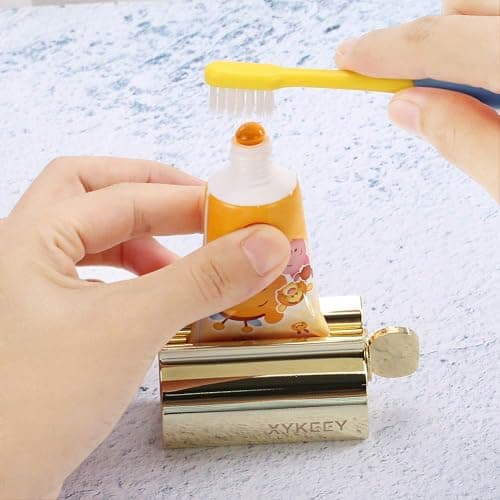 XYKEEY Toothpaste Tube Squeezer - Set of 2 Toothpaste Squeezer Rollers, Metal Toothpaste Tube Wringer Seat Holder Stand (Gold) thumbnail 2