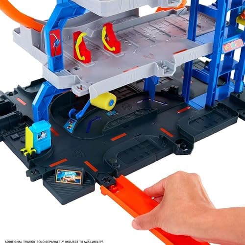 Hot Wheels Toy Car Track Set with Die-Cast Car & Helicopter, 2 Loops, Storage for 36 1:64 Scale Vehicles, Speed Snap Adapters, Mega Loop Garage thumbnail 4