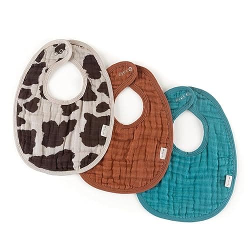 Itzy Ritzy Set of 3 Baby Bibs - Ultra-Soft Adjustable Infant & Toddler Bibs Made of Triple-Layer Cotton Muslin, Ideal for Drooling, Teething, & Eating - 3 Stylish, Coordinating Prints (Cow Print) - Cow Print