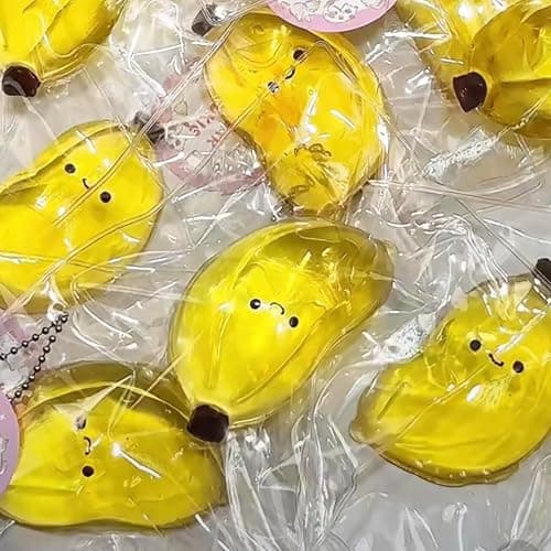 Taba Squishy ,Stress Ball,Kawaii Squishies Silicone Toys,Stress Relieving Fur Ball OPP Packaging Gifts|Squishy Fidget Toys for Anxiety&Relaxation|Perfect Desk Accessory for Adults(Golden Banana) - Image 1