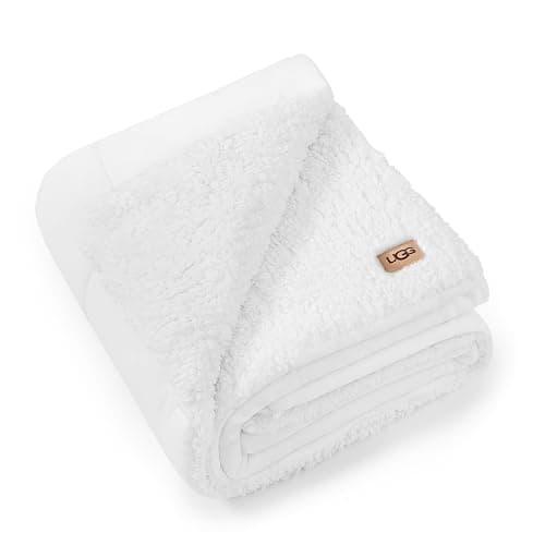 UGG Nita Throw Blanket Soft Reversible Plush Throw for Couch or Bed Washable Warm Fluffy Blanket for College Dorm Essentials and Bedding with Down Alternative Fill, 50-inch x 70-inch, White Snow - Image 1