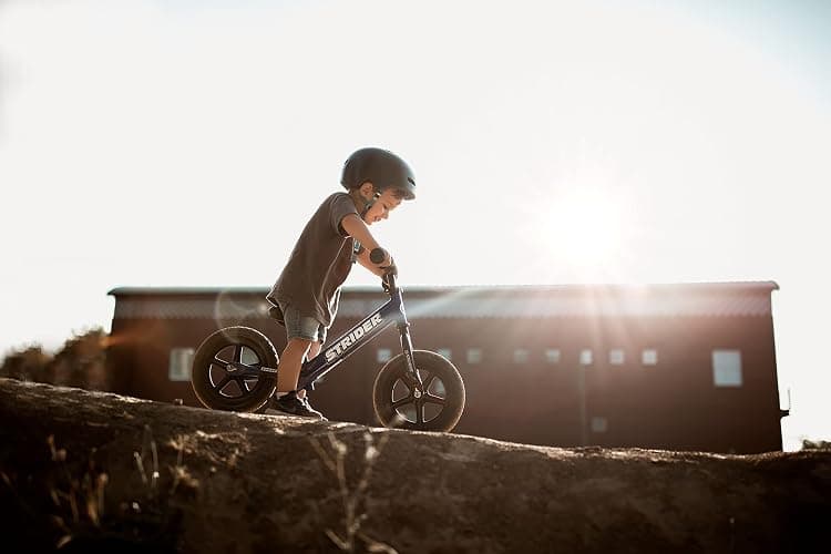 Strider 12” Sport Bike - No Pedal Balance Bicycle for Kids 1 to 4 Years - Includes Safety Pad, Padded Seat, Mini Grips & Flat-Free Tires - Tool-Free Assembly & Adjustments thumbnail 9