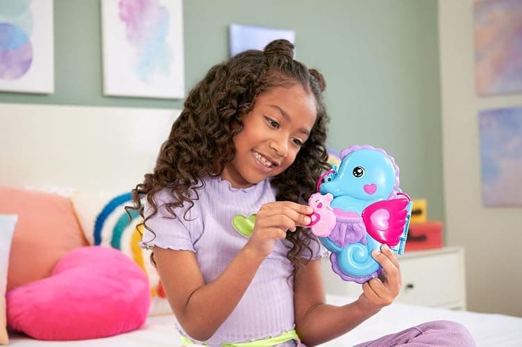 Polly Pocket Dolls & Playset with Pets & 13 Accessories, 2-in-1 Daddy & Me Seahorse Wearable Purse & Animal Toy, Starring Shani (Amazon Exclusive) thumbnail 2