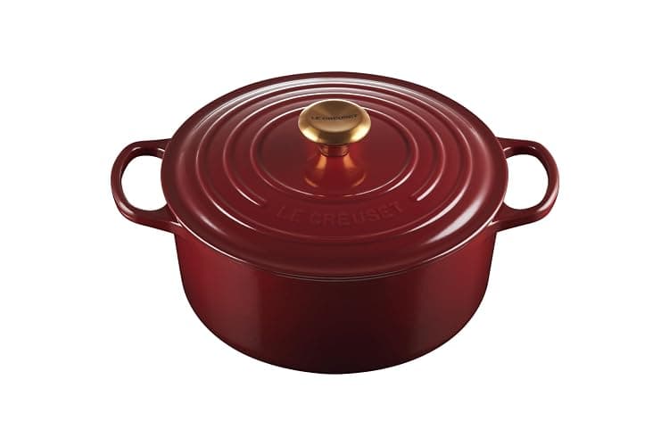 Le Creuset Enameled Cast Iron Signature Round Dutch Oven, 5.5 qt., Garnet - Image 1