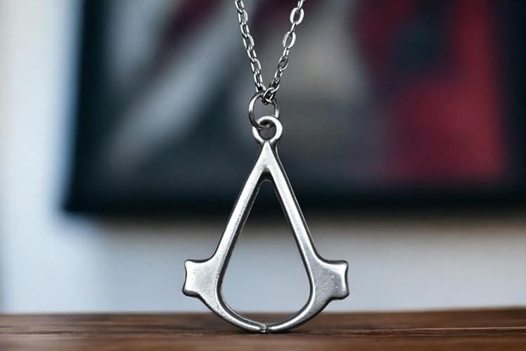 Assassin's Necklace - Silver-Plated Assassin Symbol Pendant - Gamer Necklace - Cosplay Jewelry for Fans of Brotherhood thumbnail 2