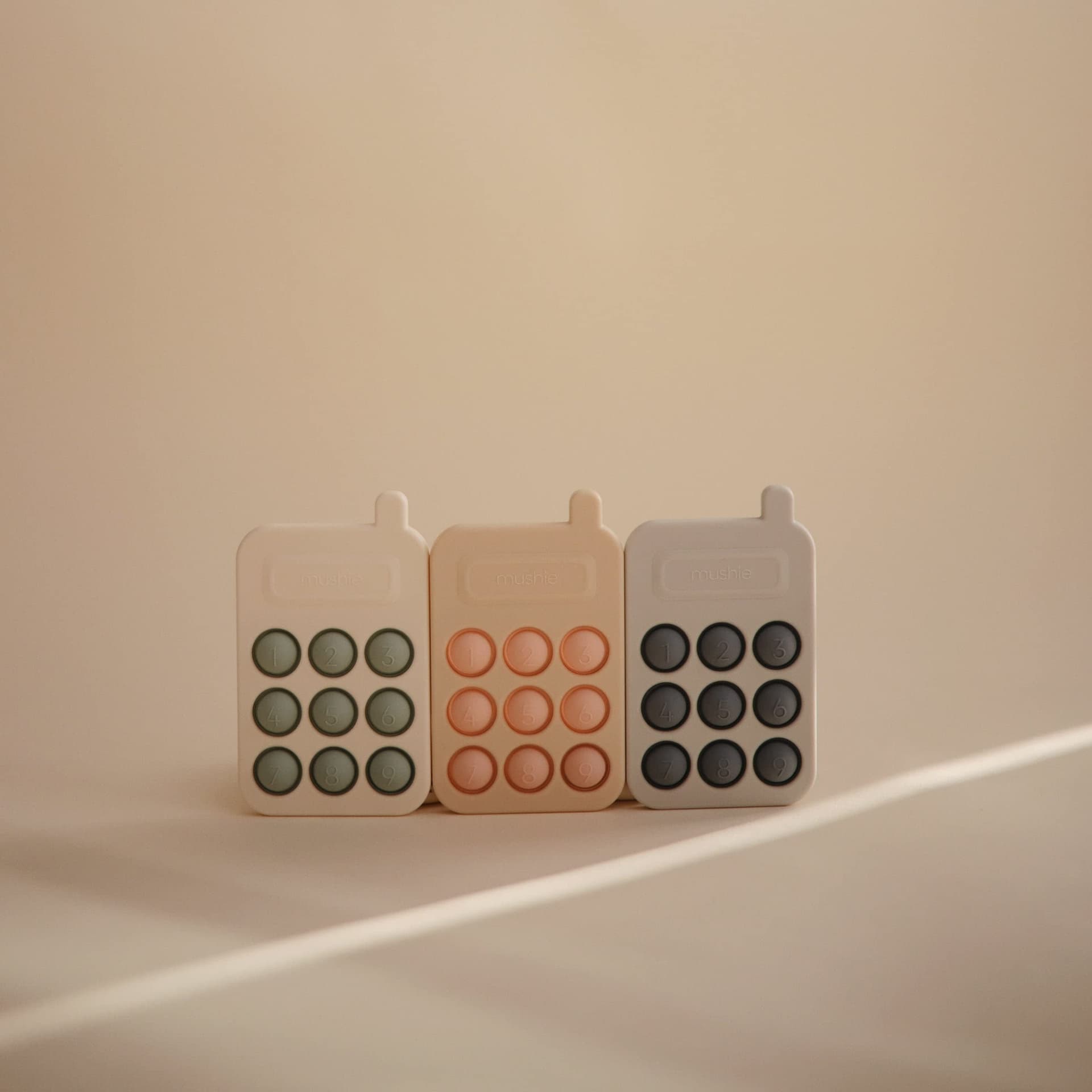 mushie Paint Palette Press Toy - Phone (Cambridge Blue) thumbnail 2