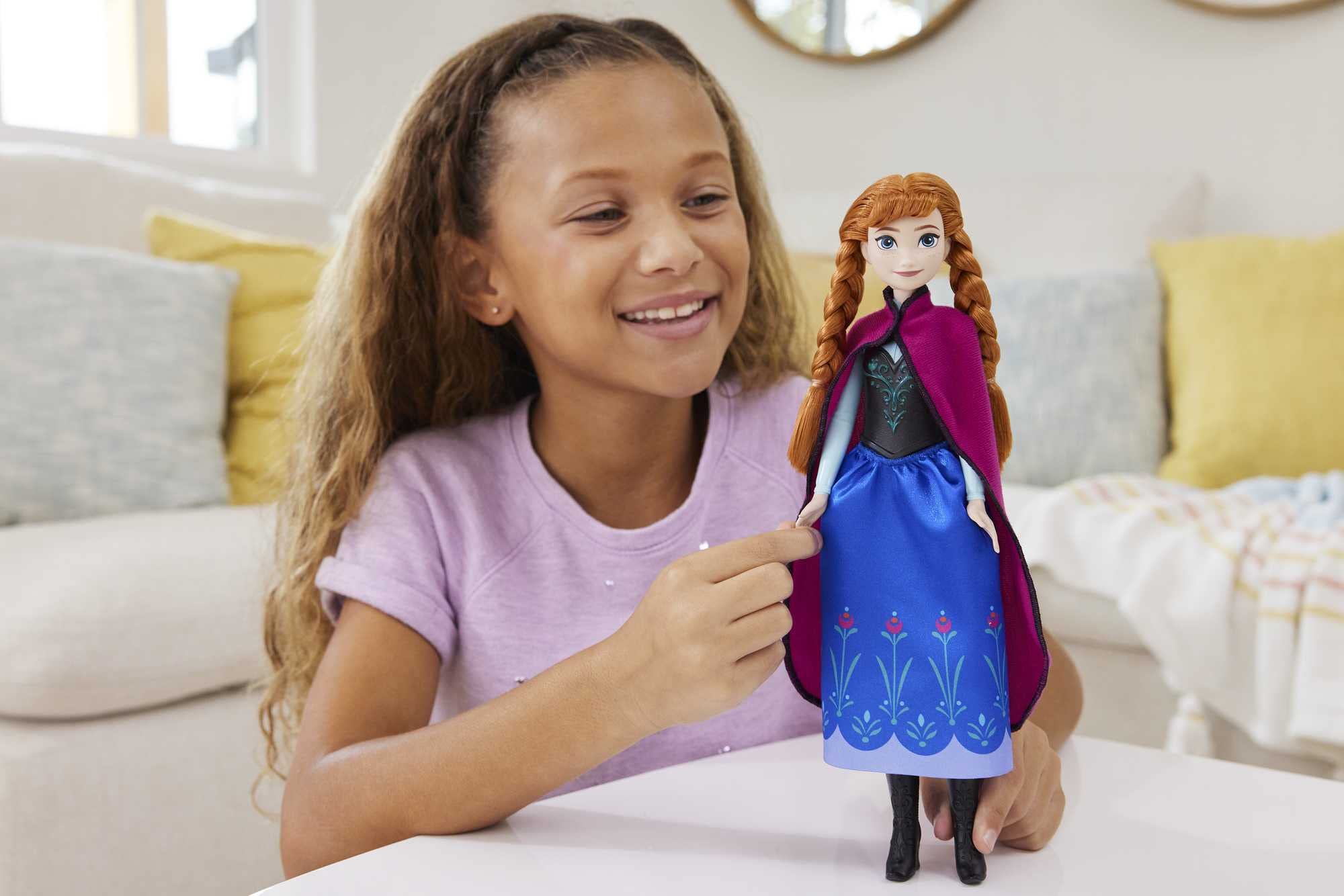 Mattel Disney Princess Dolls, New in 2023, Movable Anna Fashion Doll with Famous Outfit and Accessories, Toy Inspired by Disney's Frozen HLW49 thumbnail 2