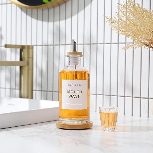 BONLONG 11.8OZ Glass Mouthwash Dispenser for Bathroom with Stainless Steel & Bamboo Nozzle, Mouthwash Cup Reusable, Bamboo Tray, and Elegant Gold Sticker.（Clear) thumbnail 2