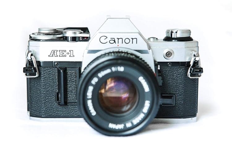 Vintage Canon AE-1 35mm SLR Camera with 50mm 1:1.8 Lens (Renewed) - Image 1