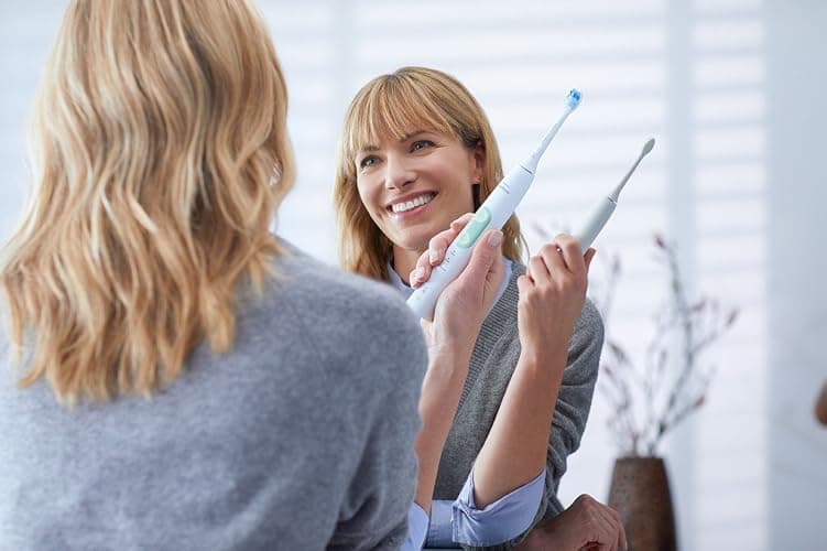 Philips Sonicare ProtectiveClean 5100 Rechargeable Electric Toothbrush, with Pressure Sensor, 3 Cleaning Modes, SmarTimer and QuadPacer, 14-Day Battery Life, Travel Case, Black, Model HX6850/60 thumbnail 3