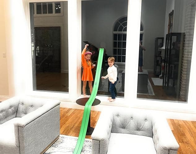 Valchemist FlexTrack 5000 Flexible Race Car Track for Kids Toy with Suction Cups Compatible with Hot Wheels and Diecast 1/64th Cars and More 15 Feet Long Rolls Up Portable Racetrack (Electric Green) thumbnail 6