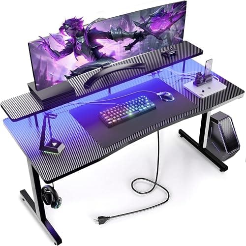 GTRACING 55 Inch Gaming Desk with LED Lights & Power Outlet, Computer Gamer Desk with Monitor Stand, Ergonomic Carbon Fiber Gaming Table Home Office Desk with Headphone Hook & Mouse Pad - Black - Image 1