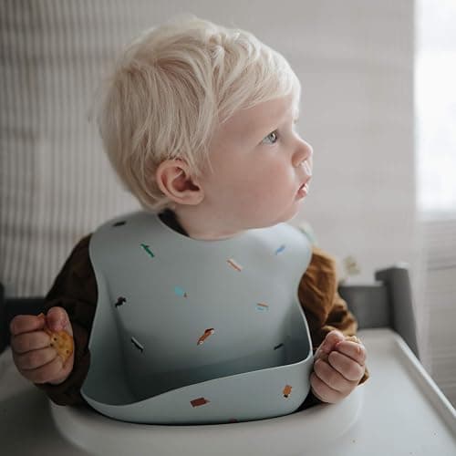Mushie Baby Silicone Bib | Adjustable Fit Waterproof Bibs | Easy Wipe Baby Feeding Bibs | 4 Adjustable Sizes with Deep Front Pockets | 100% BPA and Phthalate Free thumbnail 3