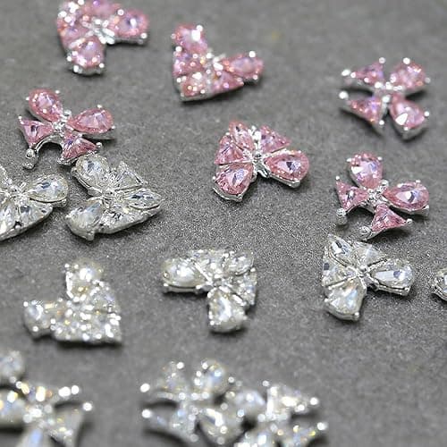 16 Stück Bunte Glitzersteine Nail Charms Nägel Zubehör Zirkon Herz Schmetterling Strasssteine Nagel Charms Nail Art Rhinestones Glitzer Steine Schleifen Herzen Nailart Edelsteine Nageldesign Nail Gems thumbnail 5