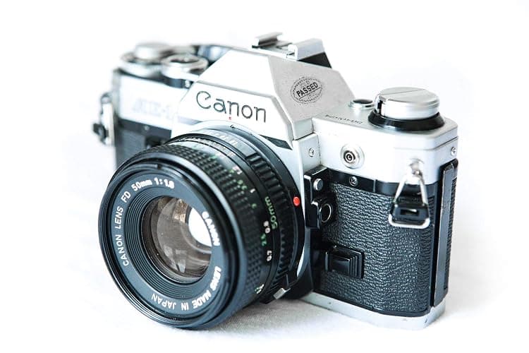 Vintage Canon AE-1 35mm SLR Camera with 50mm 1:1.8 Lens (Renewed) thumbnail 3