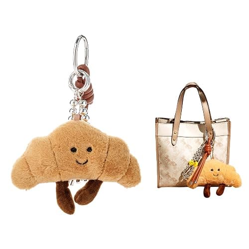 XIXIAOYAN Croissant Plush Keychain - Cute Smiling Face Plushie Charm, Soft Fluffy Stuffed Charm for Purse, Handbag, Backpack & Car Keys - Adorable Bag Charms for Women (Pom Pom Keychain Gift) - Image 1