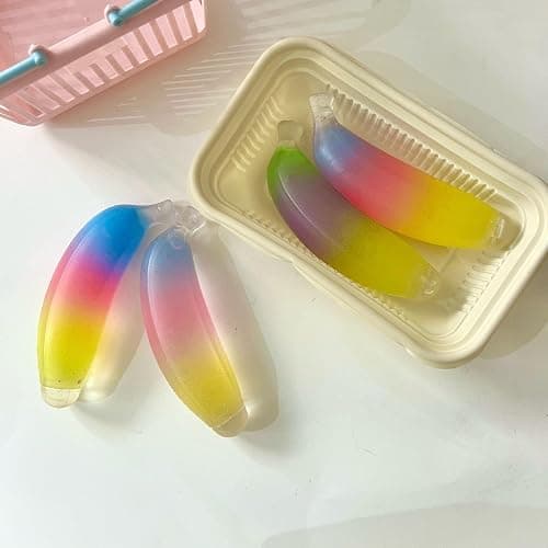 Ice Cube Squishy Banana Stress Ball – Super Soft Colorful Banana Shaped Slow Rising Squishy, Non-Toxic Squeeze Fidget Toys for Kids & Adults for ADHD, Anxiety Relief & Desk Fun thumbnail 2