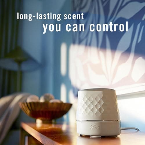 Febreze Plug Scent Booster Starter Kit – Air Freshener, Oil Diffuser, Continuous Scent Device, Includes 2 Gain Refills thumbnail 2