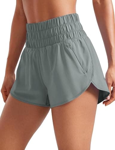 CRZ YOGA High Waisted Dolphin Running Shorts for Womens Mesh Liner for Gym Workout Athletic with Zipper Pocket - Image 1