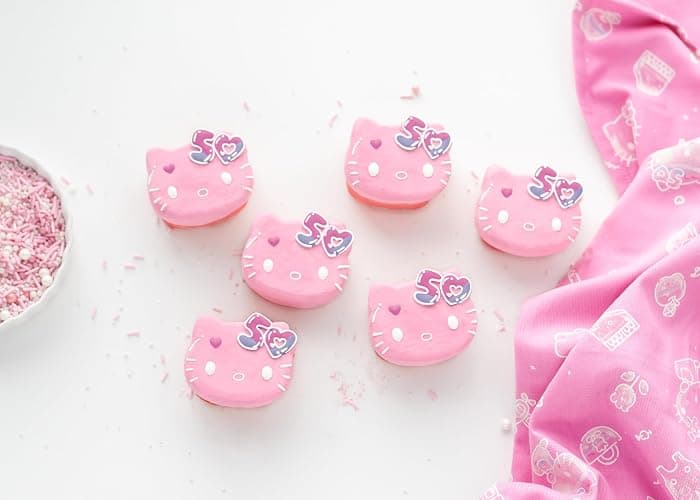 Handstand Kitchen Hello Kitty Commemorative 50th Anniversary Silicone Cupcake Mold Featuring Limited Edition Bow Detail & Pink Color thumbnail 4