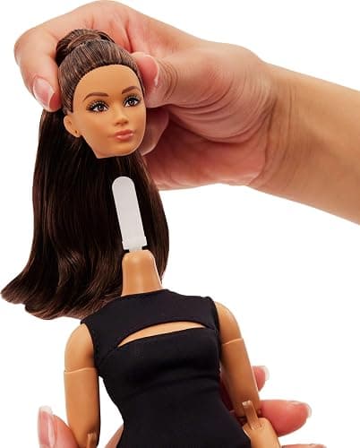 Barbie Basics Model 05 Collector Doll with Brunette Hair, Black Mini Dress & Heels, Universal-fit Fashions, Posable Curvy Body & Swappable Doll Head thumbnail 6