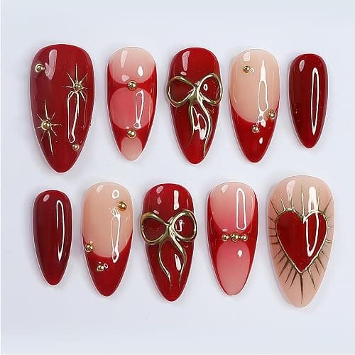 Auroriel 24 Stück Medium Almond Press on Nails Rot mit 3D Gold Schleife Herz Designs French Tip Wiederverwendbare Acrylic Fake Nails Full Cover Glitzersteine für Frauen Neujahr Party - Image 1