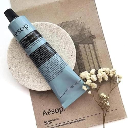 Aesop Reverence Aromatique Travel Size Hand Balm | Lotion that Gently Exfoliates Dry Hands + Nourishes with Macadamia Seed Oil and Shea Butter | 2.4 oz / 75 mL thumbnail 6