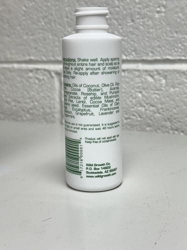 Wild Growth Hair Oil - 4oz/118.291ml by Wild Growth | Concentrated coconut, olive and jojoba blend thickens thin edges; use a few drops at a time thumbnail 2
