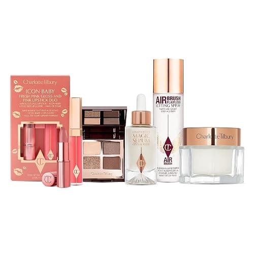 Charlotte Tilbury Holiday Beauty Set - Airbrush Flawless Setting Spray 100ml, Charlotte's Magic Cream 30ml, Magic Serum 8ml, Golden Goddess Eyeshadow Palette & Icon Baby Lip Duo - Image 1