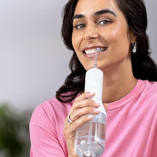 Philips Sonicare Irrigador oral Power Flosser 3000 sin cable con tecnología Quad Stream y Pulse Wave, HX3826/31, Negro, 3000, Blanco thumbnail 6