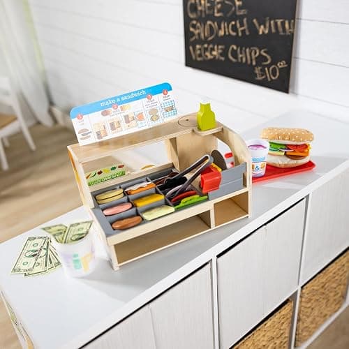 Melissa & Doug Slice-Stack-Serve, Wooden Sandwich Counter Pretend Play Store with Play Food Toys, Play Money & Deli Slicer, Preschool Toys for Kids 3+ thumbnail 9