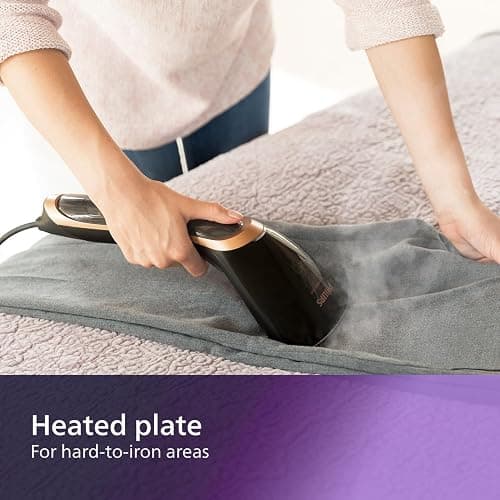 Philips Steam&Go Plus Handheld Clothes Steamer, Vertical and Horizontal Garment Steamer, No Ironing Board Needed, 0.07 Litre, 1300 W, Black/Copper, GC362/86 thumbnail 4