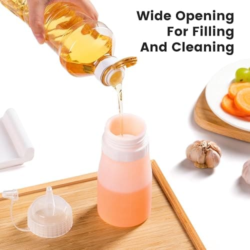 Mrsdry 16 oz Silicone Squeeze Bottles for Sauces & Oil, 4 Pack, Pink | Leak Proof Condiment Containers, Interchangeable Extra Lid, Food Grade, BPA Free Easy Squeeze for Honey, Ketchup & Dressing thumbnail 5