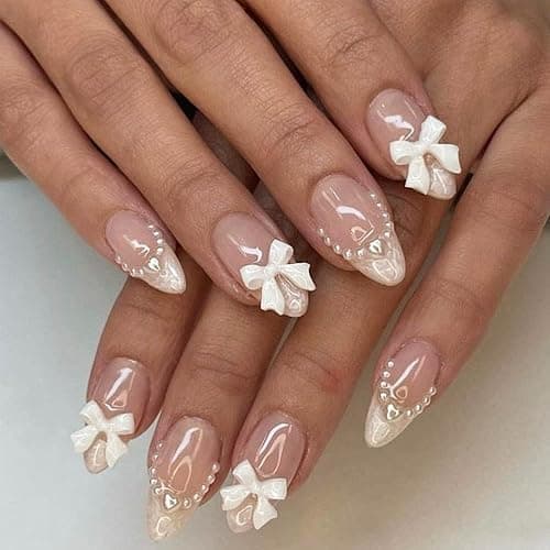 24pcs Almond Shaped Artificial Nails - French Tips with Cute Bow Charms Design - Nude Pink Acrylic Nails for Women & Girls - Image 1