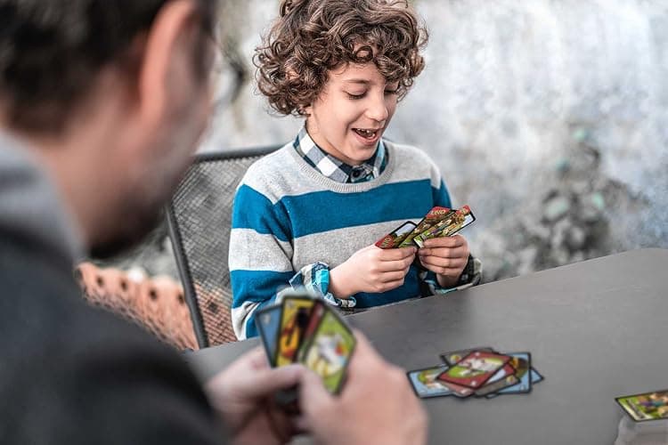 Mattel Games UNO Card Game, Gifts for Kids and Family Night, Themed to Minecraft Video Game, Travel Games, Storage Tin Box (Amazon Exclusive) thumbnail 2