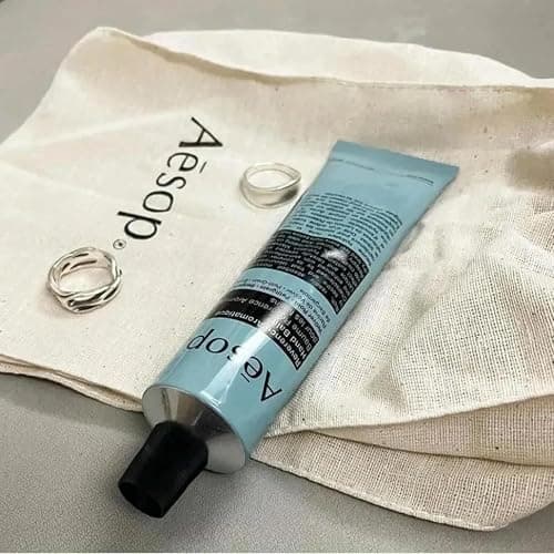 Aesop Reverence Aromatique Travel Size Hand Balm | Lotion that Gently Exfoliates Dry Hands + Nourishes with Macadamia Seed Oil and Shea Butter | 2.4 oz / 75 mL thumbnail 3