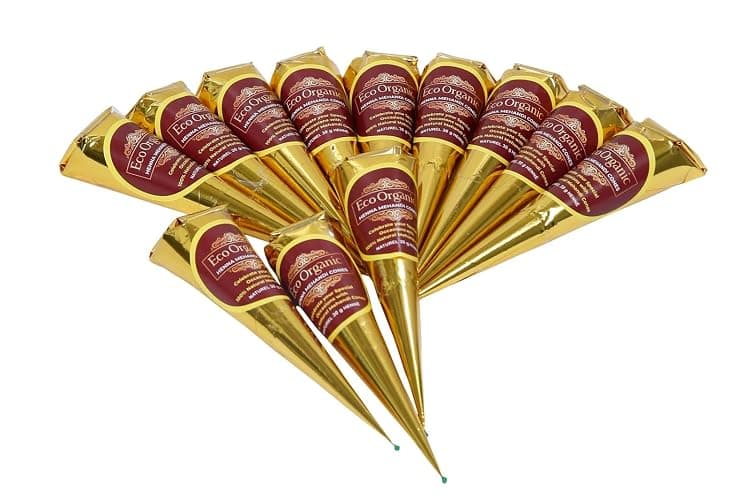 Premium Quality Eco Organic Henna Cone. %100 Natural and Pure Mehendi Cones for Special Occassions. Temporary Body art tattoo . Pack of 12 cones. Each Henna cones 25gm from India. Leaves a Dark stain and no chemical added means no itchyness on hands. 100% Nautral paste. thumbnail 2