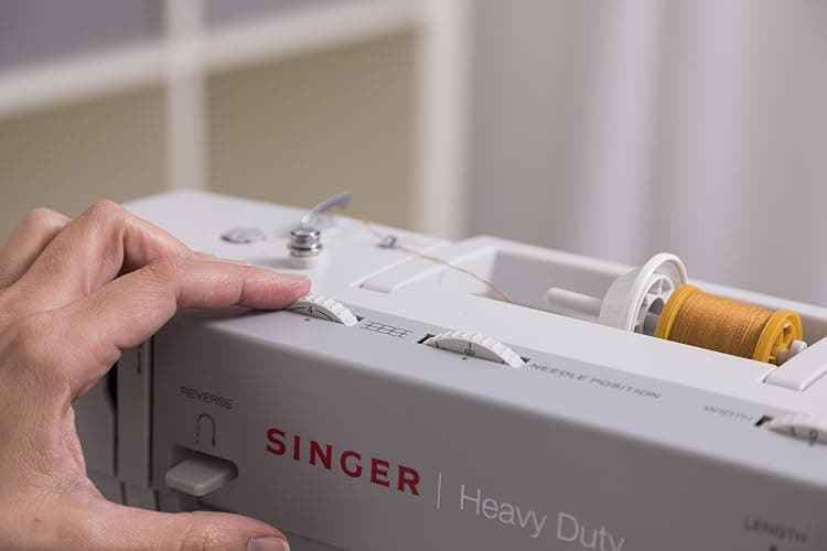 SINGER Heavy Duty 4411 High Speed Sewing Machine with Accessory Kit | Strong Motor with Enhanced Piercing Power, 69 Stitch Applications, Full Metal Frame, 4-Step Buttonhole & LED Light, Grey thumbnail 12