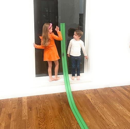 Valchemist FlexTrack 5000 Flexible Race Car Track for Kids Toy with Suction Cups Compatible with Hot Wheels and Diecast 1/64th Cars and More 15 Feet Long Rolls Up Portable Racetrack (Electric Green) thumbnail 2