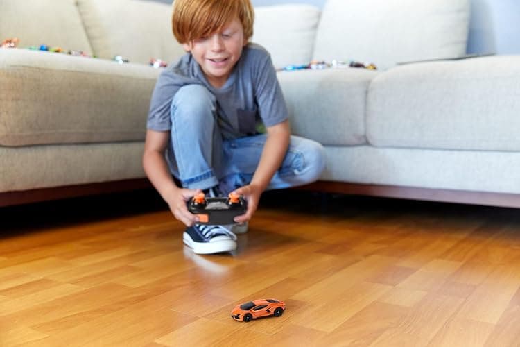 Hot Wheels RC Toy Car, Remote-Control Lamborghini Revuelto in 1:64 Scale, Recharge with USB Cable, Races & Stunts On- and Off-Track with Turbo Boost thumbnail 2