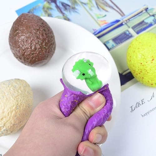 4 Pack Dinosaur Theme Egg Stress Balls, Dino Squishy Ball Set, Squeeze Balls for Adults, Fidget Balls to Relax, Stress Relieve, Party Favors, Birthday, Goodie Bag Stuffers, Increase Entertainment thumbnail 2