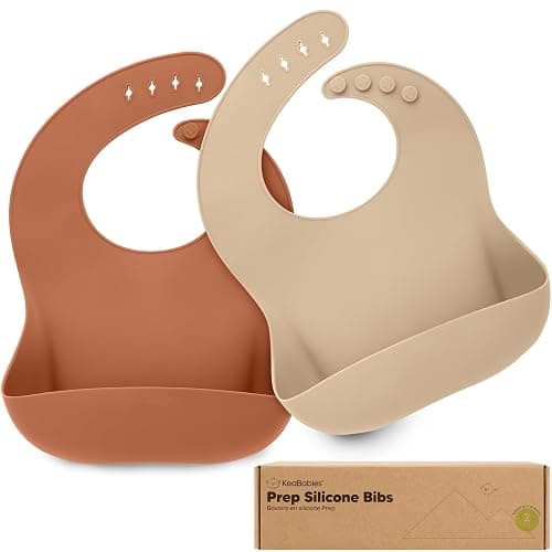KeaBabies 2-Pack Silicone Bibs for Babies, Toddlers Girl, Boy – Sturdy Food-Grade Baby Bibs for Eating, Large Food Catcher, Clean & Put On Easily, Waterproof Toddler Feeding Essentials (Terracotta) - Image 1
